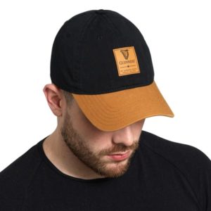 BUY GUINNESS BLACK & CARAMEL CAP WITH LEATHER PATCH IN WHOLESALE ONLINE